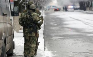 Опубликованы фото вооруженных людей и военной техники на улицах Луганска — ОБСЕ (фото)