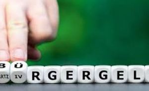 На какую поддержку в Германии может рассчитывать получатель Burgergeld при выходе на работу