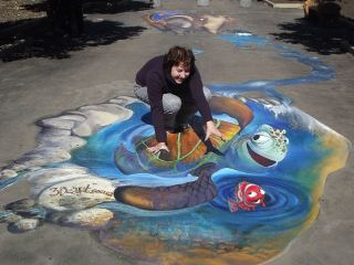 Художники из Днепропетровска украсили дороги Алчевска D рисунками фото