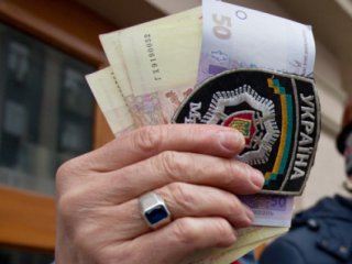 Следователю из Луганской области грозит  лет тюрьмы за взятку